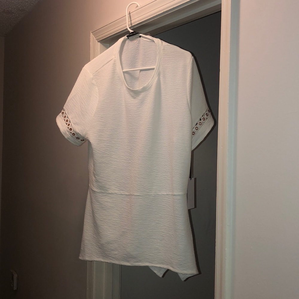 White Ivanka Trump blouse with gold accents